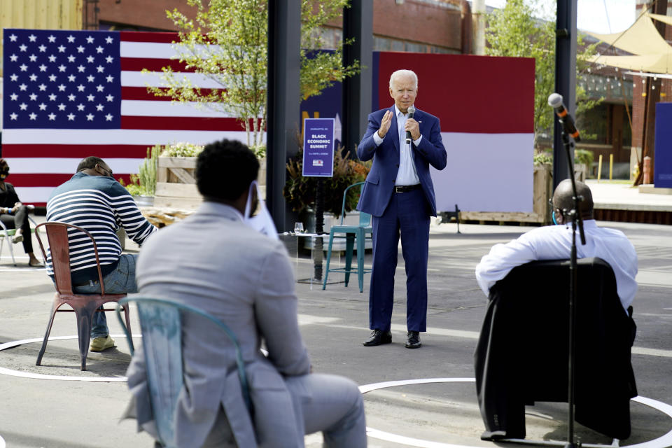 FILE - In this Sept. 23, 2020, file photo Democratic presidential candidate former Vice President Joe Biden speaks during a Biden for President Black economic summit at Camp North End in Charlotte, N.C. The final stretch of a presidential campaign is typically a nonstop mix of travel, caffeine and adrenaline. But as the worst pandemic in a century bears down on the United States, Joe Biden is taking a lower key approach. (AP Photo/Carolyn Kaster, File)