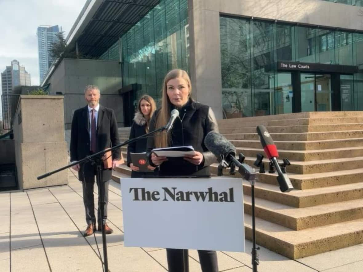 Photojournalist Amber Bracken announced outside B.C. Supreme Court on Feb.13, 2023 that she and news outlet The Narwhal are suing the RCMP after she was arrested attempting to cover conflict over the Coastal GasLink pipeline project on Wet’suwet’en territory west of Prince George, B.C. in November 2021. (YouTube/The Narwhal - image credit)