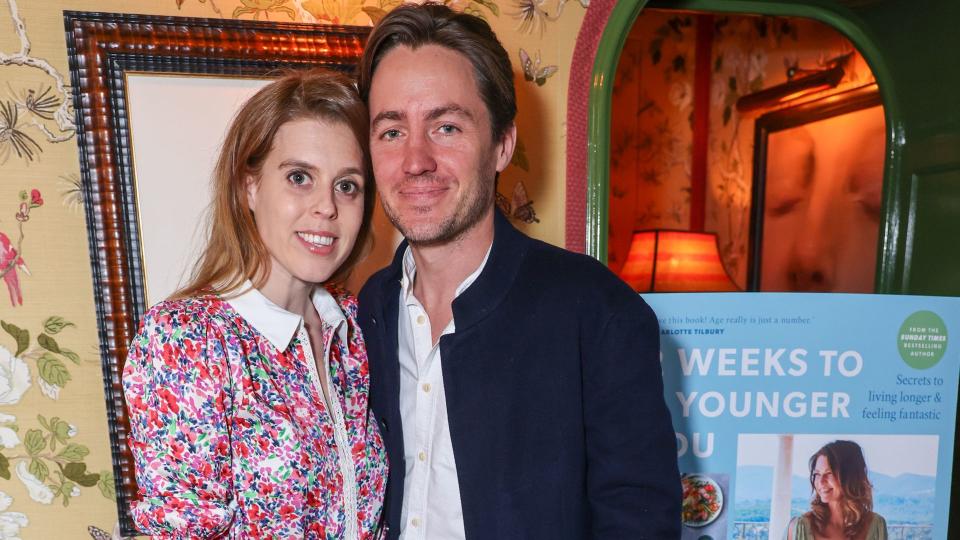 Princess Beatrice wearing a pink floral dress with husband Edoardo