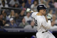 New York Yankees designated hitter Aaron Judge watches his home run during the fifth inning of a baseball game against the Chicago Cubs, Saturday, June 11, 2022, in New York. (AP Photo/Adam Hunger)