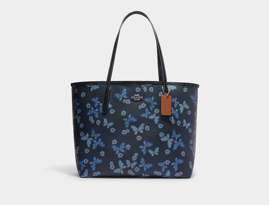 City Tote With Lovely Butterfly Print. Image via Coach Outlet.