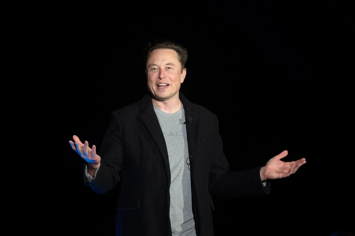 Elon Musk  twitter gestures as he speaks during a press conference at SpaceX's Starbase facility near Boca Chica Village in South Texas on February 10, 2022. - Billionaire entrepreneur Elon Musk delivered an eagerly-awaited update on SpaceX's Starship, a prototype rocket the company is developing for crewed interplanetary exploration. (Photo by JIM WATSON / AFP) (Photo by JIM WATSON/AFP via Getty Images)