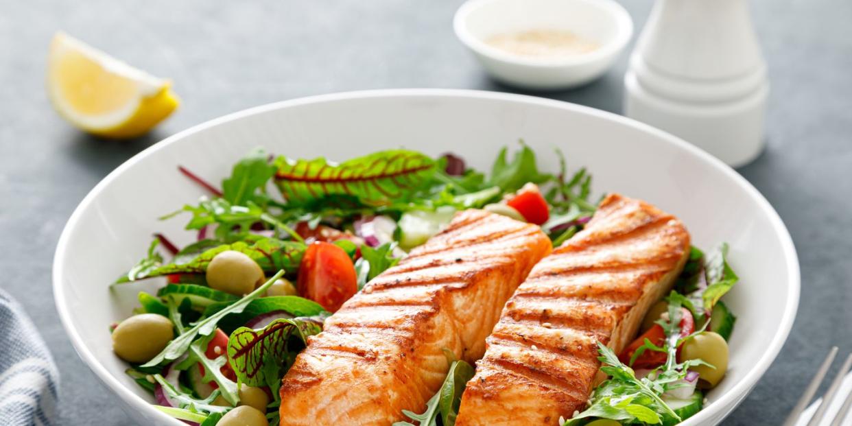 grilled salmon fillet and fresh vegetable salad