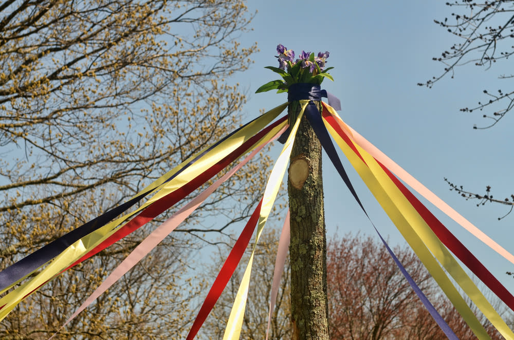 Whip out your fresh flower crown — because today is May Day