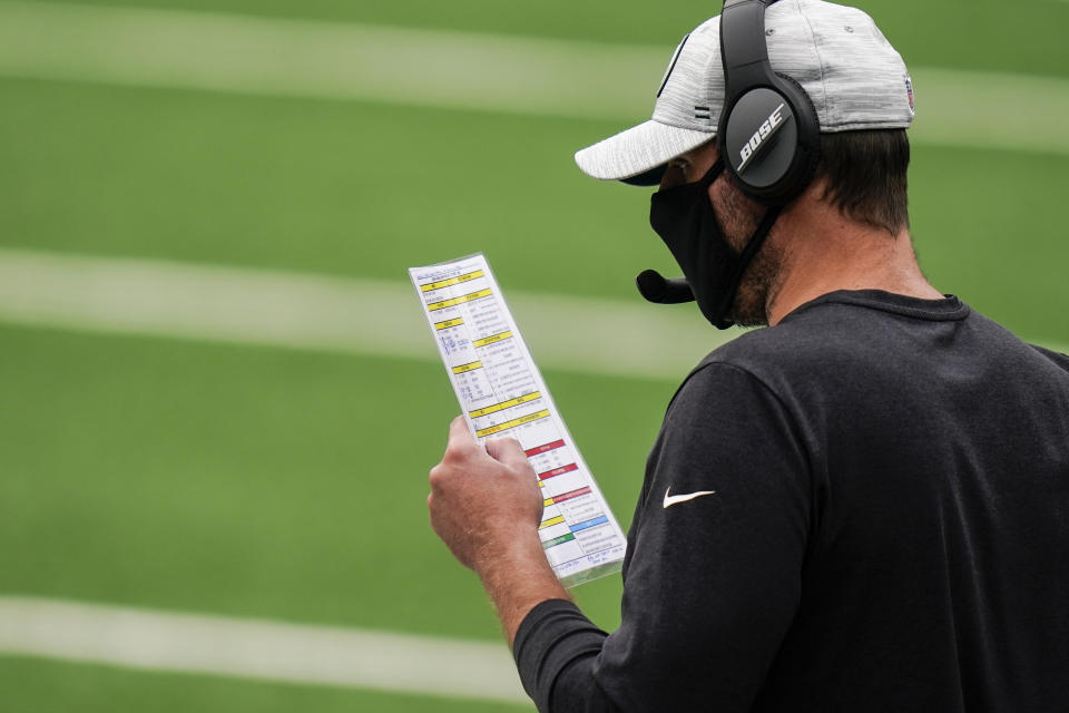 New York Jets head coach Adam Gase works the sidelines during the first half of an NFL football game against the Arizona Cardinals, Sunday, Oct. 11, 2020, in East Rutherford. (AP Photo/Seth Wenig)