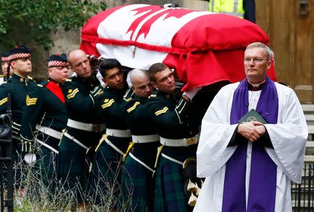 Soldiers carry the casket from the church following the funeral service for Cpl. Nathan Cirillo in Hamilton, Ontario October 28, 2014. REUTERS/Mark Blinch