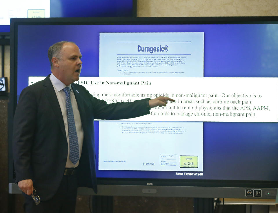 State's attorney Brad Beckworth speaks during closing arguments in Oklahoma's ongoing opioid drug lawsuit against Johnson & Johnson, Monday, July 15, 2019, in Norman, Okla. (AP Photo/Sue Ogrocki, Pool)