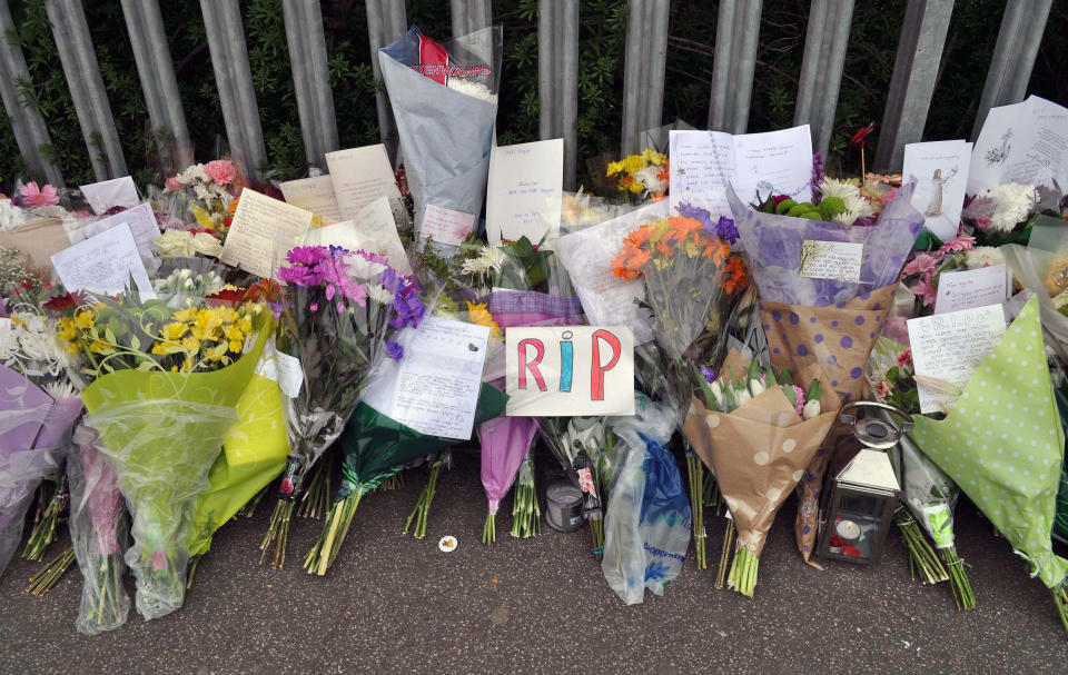 Floral tributes were left to teacher Ann Maguire (Picture: SWNS)