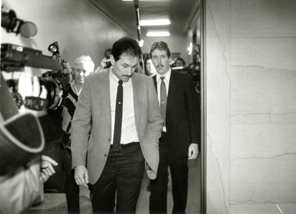 Milwaukee police officers John Balcerzak (left) and Joseph Gabrish, shown in a 1992 photograph, were fired when they were accused of returning Konarek Sinthasomphone back to killer Jeffrey Dahmer.