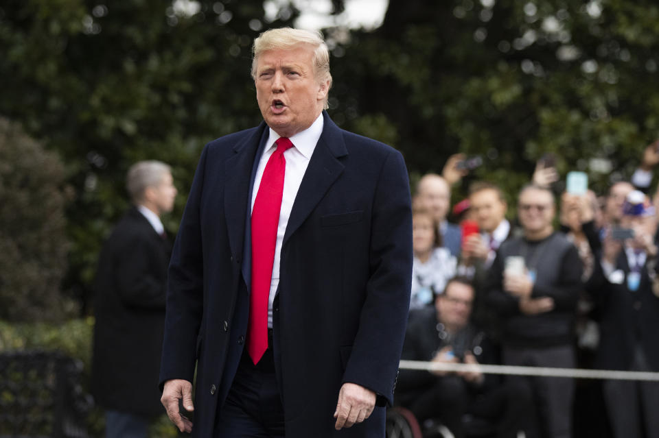 President Donald Trump speaks to the members of the media before leaving the White House, Monday, Jan. 13, 2020, in Washington, for a trip to watch the College Football Playoff national championship game between LSU and Clemson in New Orleans. (AP Photo/Manuel Balce Ceneta)