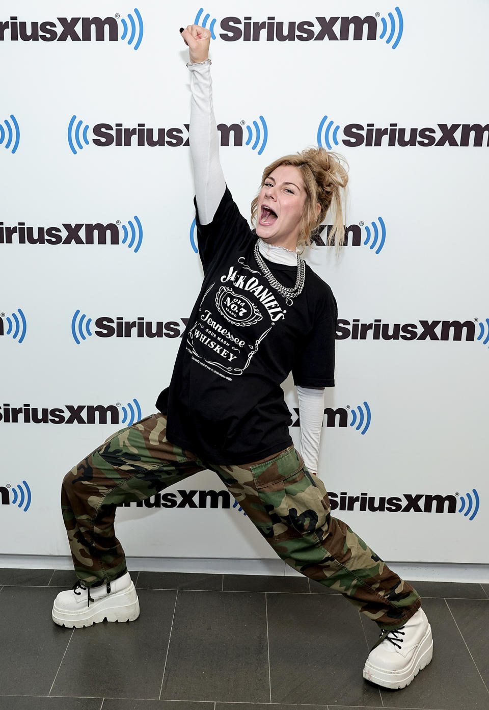 <p>Jax shows off her excitement on Aug. 17 while visiting SiriusXM Studios in N.Y.C.</p>