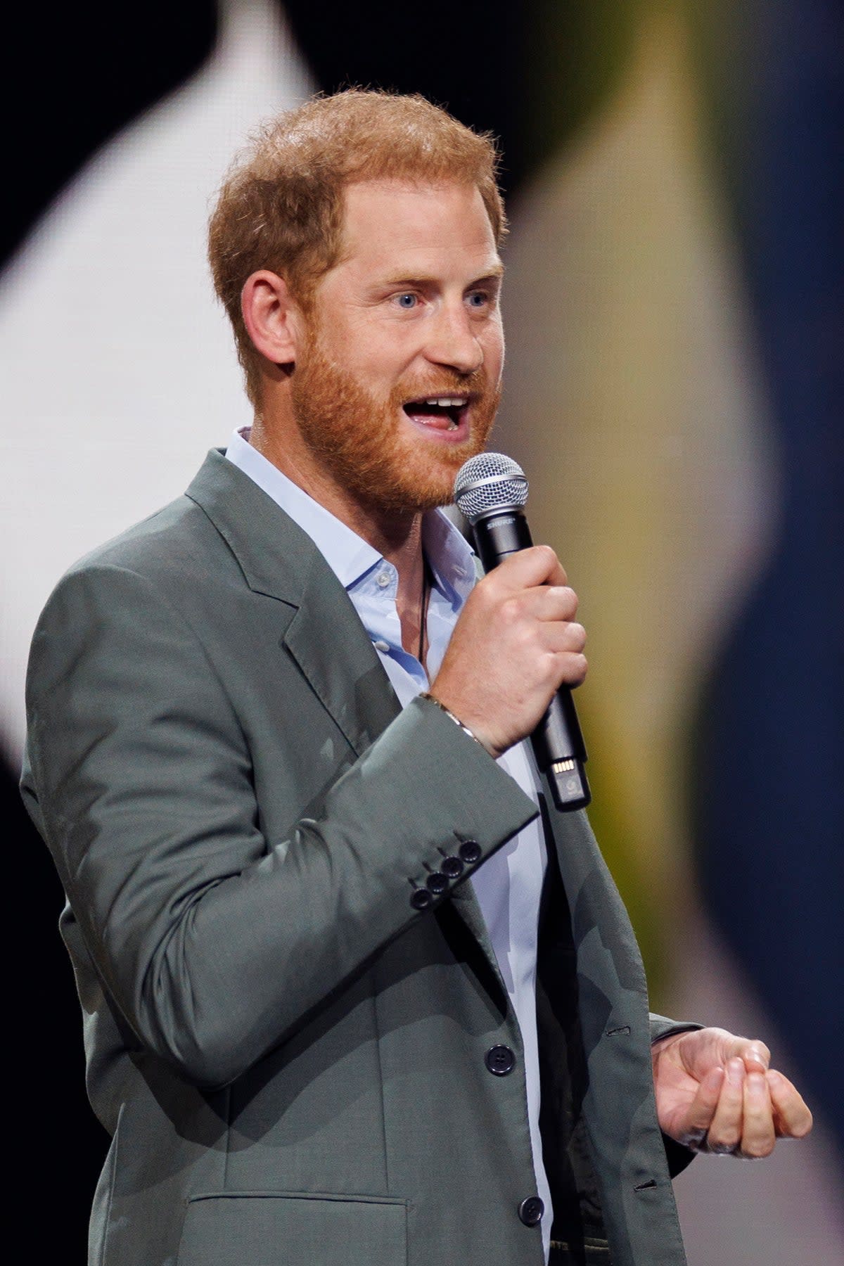 Britain's Prince Harry, Duke of Sussex, delivers a speech during the Opening ceremony of the 6th Invictus Games in Duesseldorf (EPA)