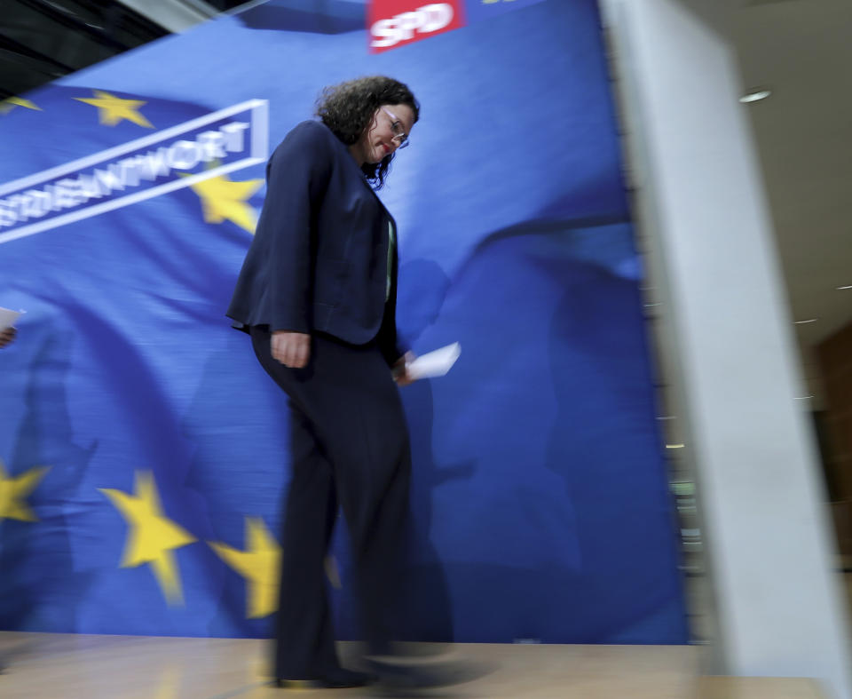 FILE -- In this Monday, May 27, 2019 photo taken with a long time expsure Andrea Nahles, chairwomen of the German Social Democratic Party (SPD), leaves after a press conference following a party's board meeting in Berlin, Germany. (AP Photo/Michael Sohn, file)