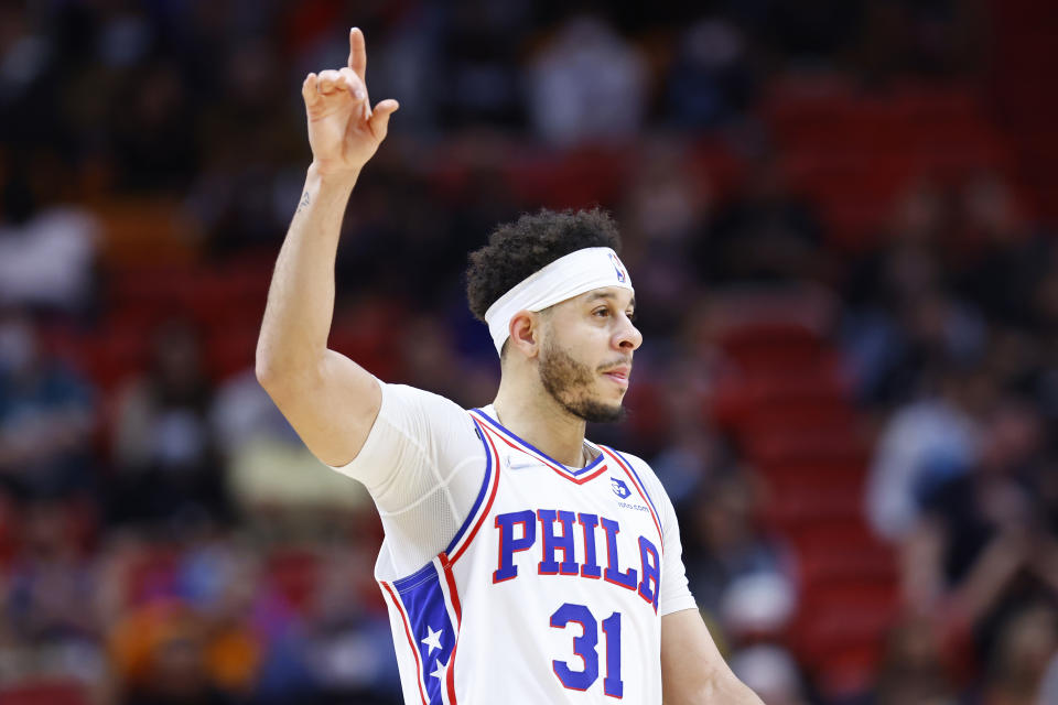 MIAMI, FLORIDA - JANUARY 15: Seth Curry #31 of the Philadelphia 76ers celebrates against the Miami Heat at FTX Arena on January 15, 2022 in Miami, Florida. NOTE TO USER: User expressly acknowledges and agrees that, by downloading and or using this photograph, User is consenting to the terms and conditions of the Getty Images License Agreement. (Photo by Michael Reaves/Getty Images)