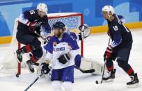 Ice Hockey - Pyeongchang 2018 Winter Olympics - Men's Playoff Match - U.S. v Slovakia - Gangneung Hockey Centre, Gangneung, South Korea - February 20, 2018 - Ryan Donato and Jordan Greenway of the U.S. in action as Team USA scores their second goal. REUTERS/Grigory Dukor