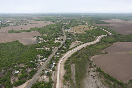 A levee, which acts as a border wall, is pictured in the Rio Grande Valley sector, near McAllen, Texas, U.S., April 4, 2018. REUTERS/Loren Elliott