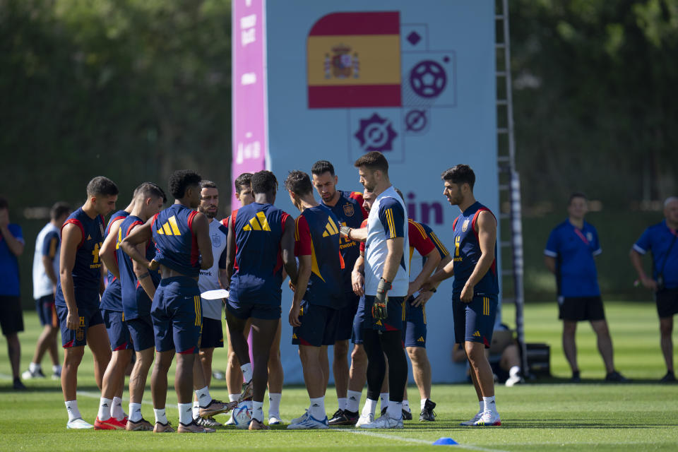 Spain players huddle during a training session at Qatar University, in Doha, Qatar, Tuesday, Nov. 29, 2022. Spain will play its first final match in Group E in the World Cup against Japan on Dec. 1. (AP Photo/Julio Cortez)