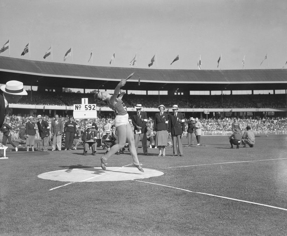 Winning the women's discus event at the 1956 Olympics in Melbourne with a record-breaking throw of 176ft 1.5in