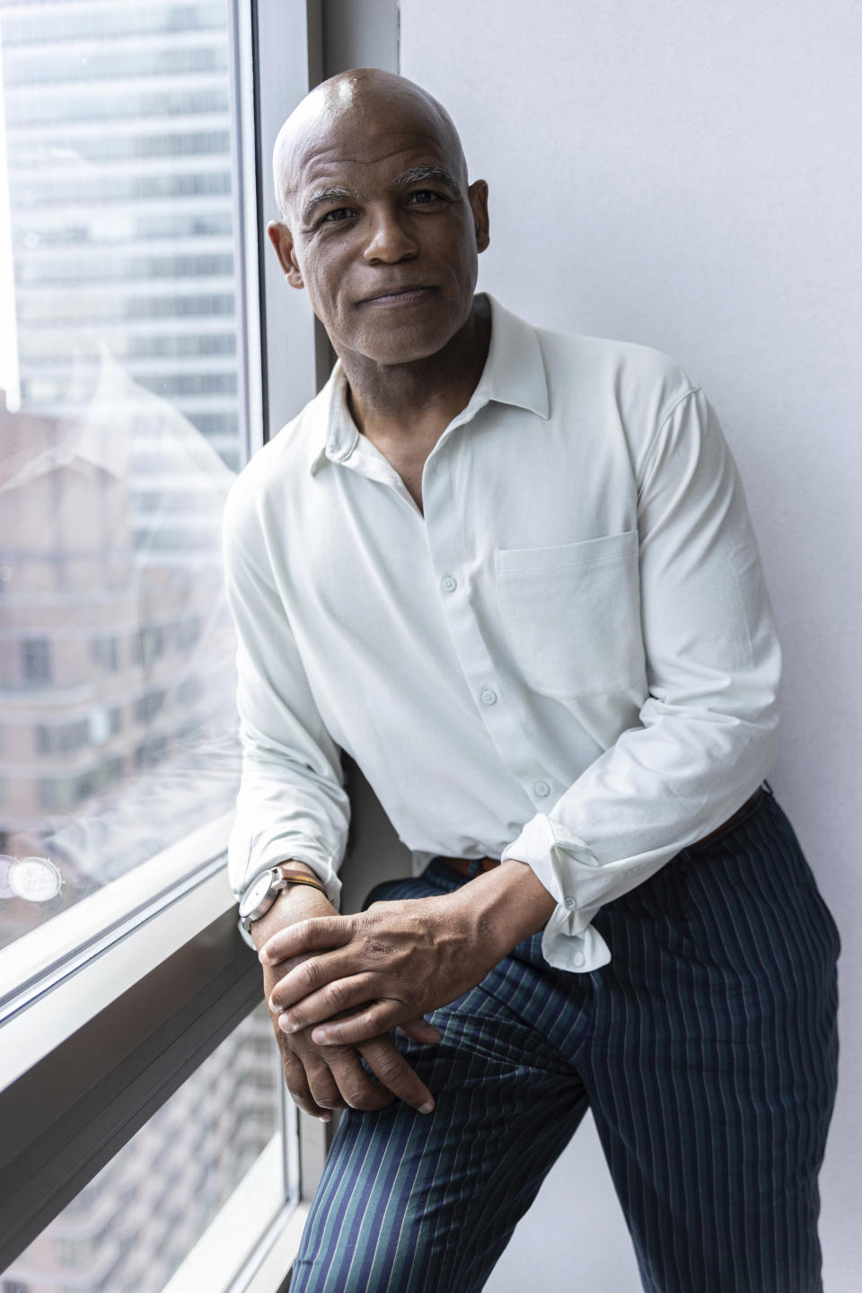 Gene Folkes, a former contestant on "The Apprentice," is photographed in his apartment in downtown Manhattan on Wednesday, June 5, 2024, in New York. A producer's new account of Donald Trump's behavior on "The Apprentice" is resurfacing allegations about whether he mistreated Black people who appeared on the show. (AP Photo/Stefan Jeremiah)