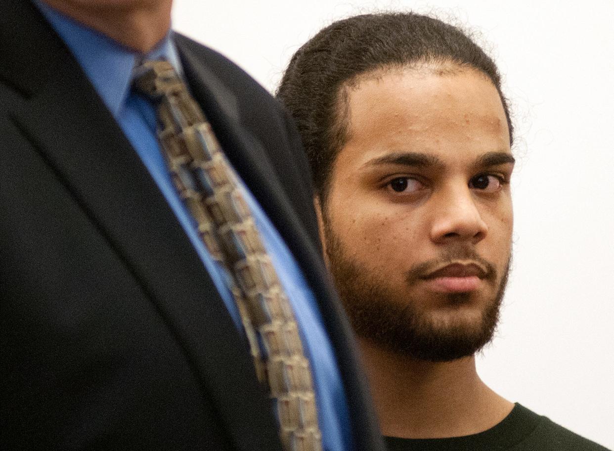 Attorney E. Peter Parker represents Angel Santiago, right, is arraigned Thursday in Worcester Superior Court. He is represented by lawyer E. Peter Parker, standing next to him.