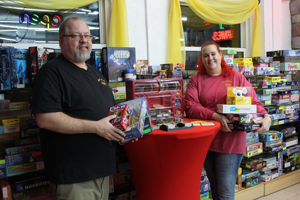 LaSalle residents Kristian (Kris) Bezeau (left) and Erika Branstetter own and operate Our House Games. The store located at 1211 S Monroe St. sells and borrows games to customers.