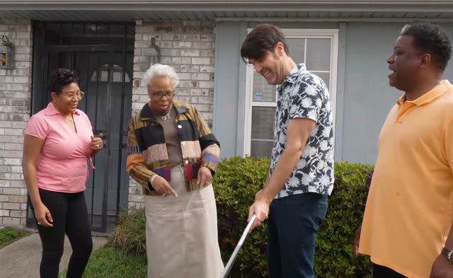 <p>HGTV</p> Brian Patrick Flynn with HGTV 2023 Urban Oasis winner Phyliss Jackson-Polk and her nephew Lloyd and niece Tash.