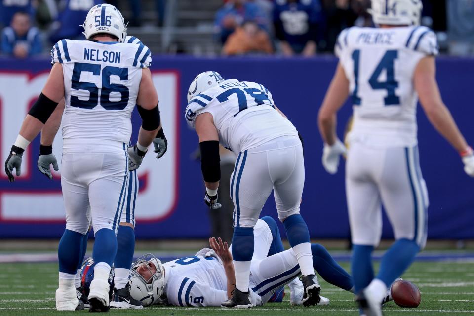 EAST RUTHERFORD, NEW JERSEY - JANUARY 01: Nick Foles #9 of the Indianapolis Colts is injured against the New York Giants during the second quarter at MetLife Stadium on January 01, 2023 in East Rutherford, New Jersey.