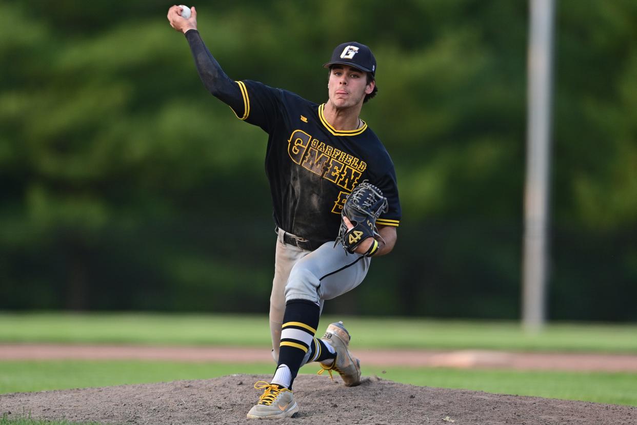 Garfield's Eric Geddes, shown tossing one of his many 2023 gems in the district semifinals, is back to lead the G-Men once again.