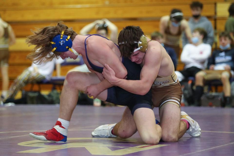 Clarkstown South's Liam Brew defeats Clarkstown North's Matthew Cortelli in a 152-pound match during a dual meet at Clarkstown North High School in New City on Thursday, January 27, 2022.  Clarkstown South won the meet 41-30.