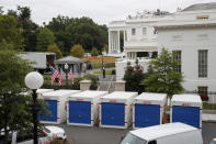 <p>Storage containers line the driveway as the West Wing of the White House in Washington goes through renovations while President Donald Trump is spending time at his golf resort in New Jersey, Friday, Aug. 11, 2017. (AP Photo/J. Scott Applewhite) </p>