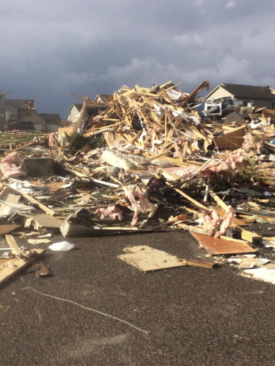 Extensive damage to homes is pictured in the aftermath of a tornado that touched down in Washington, Illinois