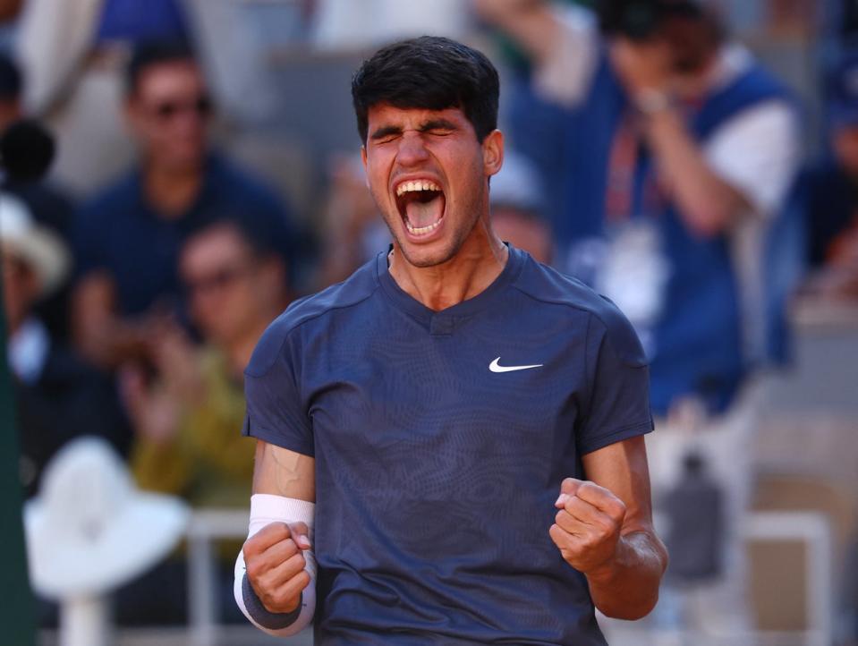 Carlos Alcaraz battled past Jannik Sinner in five sets  (Reuters)