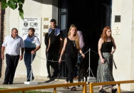 Relatives and friends of soccer player Emiliano Sala, former striker of French club Nantes, who died in a plane crash in the English Channel, attend his wake at Club Atletico y Social San Martin in Progreso, Argentina February 16, 2019. REUTERS/Sebastian Granata