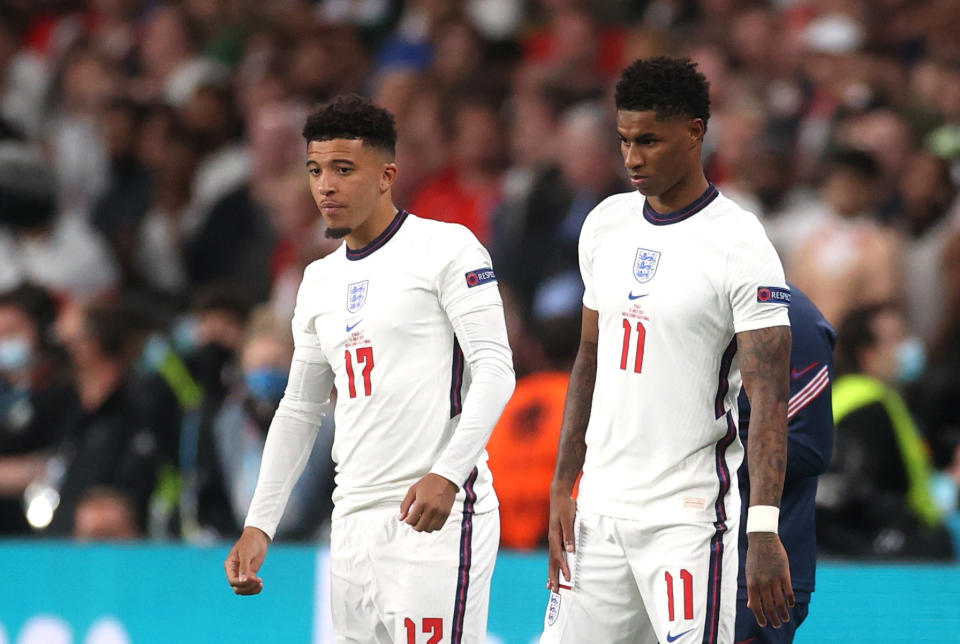 Soccer Football - Euro 2020 - Final - Italy v England - Wembley Stadium, London, Britain - July 11, 2021 England's Marcus Rashford and Jadon Sancho prepare to come on as substitutes Pool via REUTERS/Carl Recine