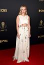 <p>Gillian Anderson had some fun with her 2021 Emmy look, wearing a white gown by Chloé with a cut-out detail and plenty of fringing.</p>