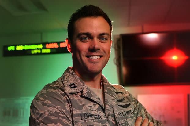 FILE -- In this July 22, 2015 file photo, Capt. Matthew Lohmeier, 460th Operations Group Block 10 chief of training, stands in the Standardized Space Trainer on Buckley Air Force Base, Colorado. 