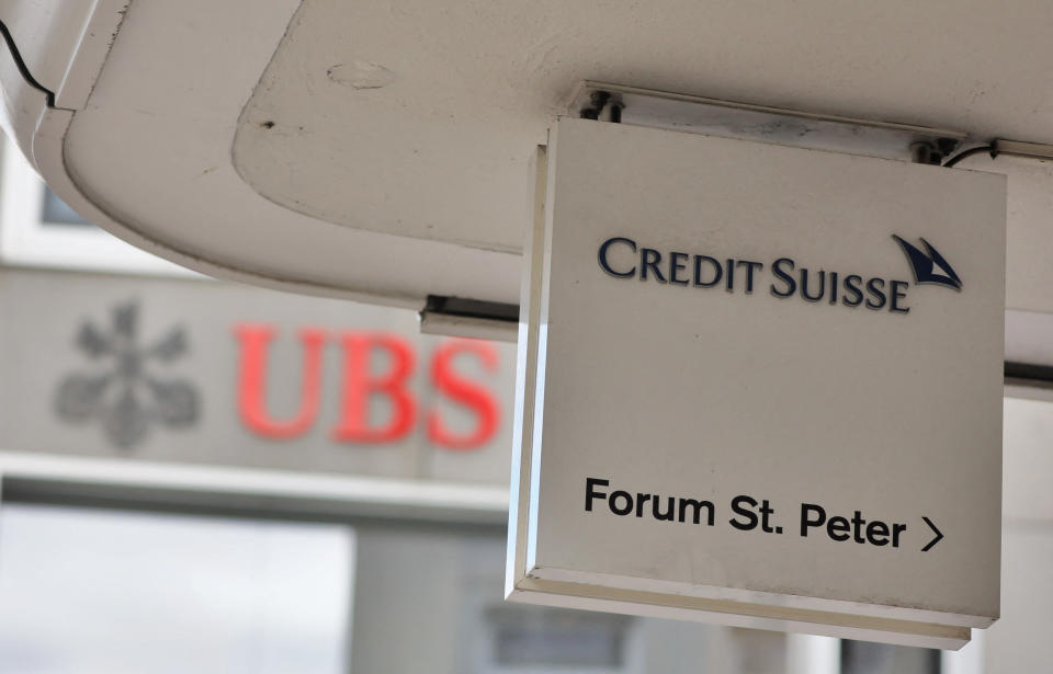 Logos of Swiss bank UBS and Credit Suisse in Zurich, Switzerland March 20, 2023. REUTERS/Denis Balibouse