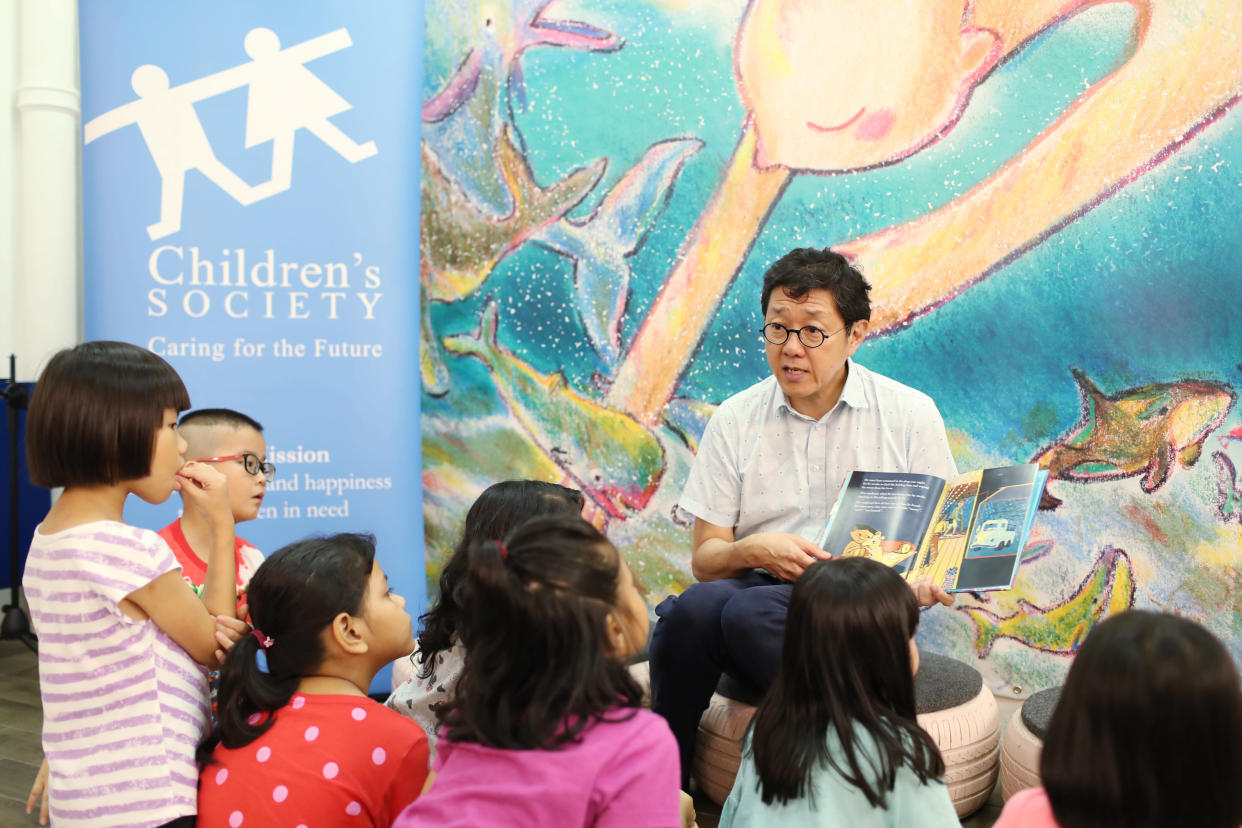 Eight beneficiaries from Student Care @ Children’s Society, aged between seven and eight, at a reading of the story by author Goh Eck Kheng on 29 May, 2019. (PHOTO: SCS)