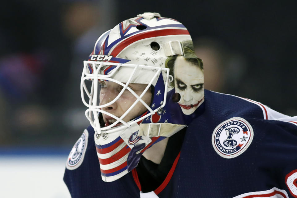 THIS CORRECTS THAT KIVLENIEKS DIED OF CHEST TRAUMA FROM AN ERRANT FIREWORKS MORTAR BLAST AND NOT A SUBSEQUENT FALL AS AUTHORITIES PREVIOUSLY REPORTED - FILE - Columbus Blue Jackets goaltender Matiss Kivlenieks (80) is shown during the second period of an NHL hockey game in New York, in this Sunday, Jan. 19, 2020, file photo. The Columbus Blue Jackets and Latvian Hockey Federation said Monday, July 5, 2021, that 24-year-old goaltender Matiss Kivlenieks has died. A medical examiner in Michigan says an autopsy has determined that Columbus Blue Jackets goaltender Matiss Kivlenieks died of chest trauma from an errant fireworks mortar blast, and not a fall as authorities previously reported. Police in Novi, Michigan, said the mortar-style firework tilted slightly and started to fire toward people nearby Sunday night, July 4. (AP Photo/Kathy Willens, File)