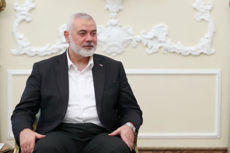 Iranian President Ebrahim Raisi meets with Palestinian group Hamas' top leader, Ismail Haniyeh, in Tehran