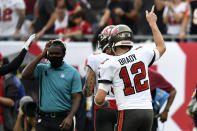 Tampa Bay Buccaneers quarterback Tom Brady (12) reacts after throwing his 600th career touchdown pass during the first half of an NFL football game against the Chicago Bears Sunday, Oct. 24, 2021, in Tampa, Fla. (AP Photo/Jason Behnken)