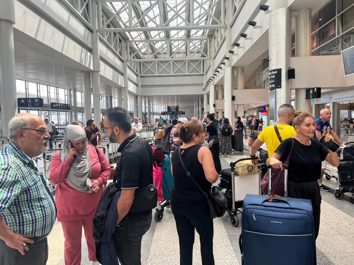 Passengers wait for their flights at Beirut-Rafic Hariri International Airport, following the exchange between Hezbollah and Israel in southern Lebanon, in the Southern Suburbs of Beirut, Lebanon (EPA)