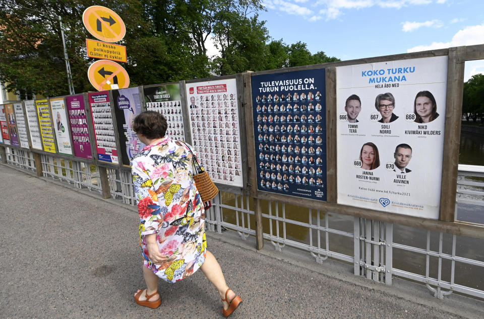 Municipal elections campaign posters of various different parties spread along a footpath in Turku, Finland, on June 8, 2021. Finland holds local elections upcoming Sunday June 13, 2021, in a first litmus test for the popular young Social Democratic prime minister, Sanna Marin, who took office a mere 18 months ago. (Vesa Moilanen/Lehtikuva via AP)