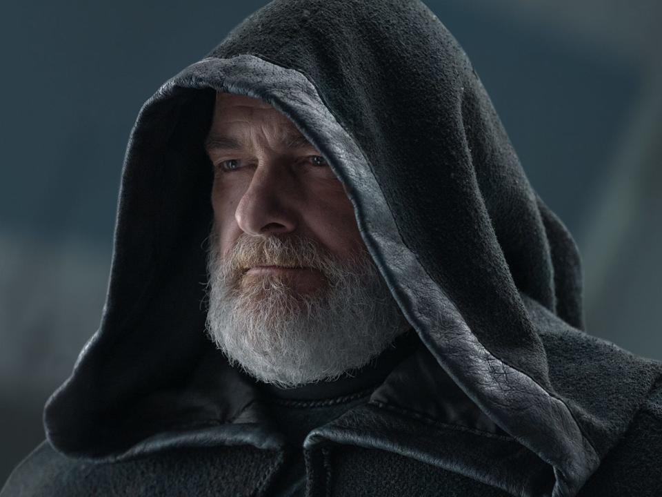 Ray Stevenson wearing a cloak as Baylan Skoll  in "Ahsoka."