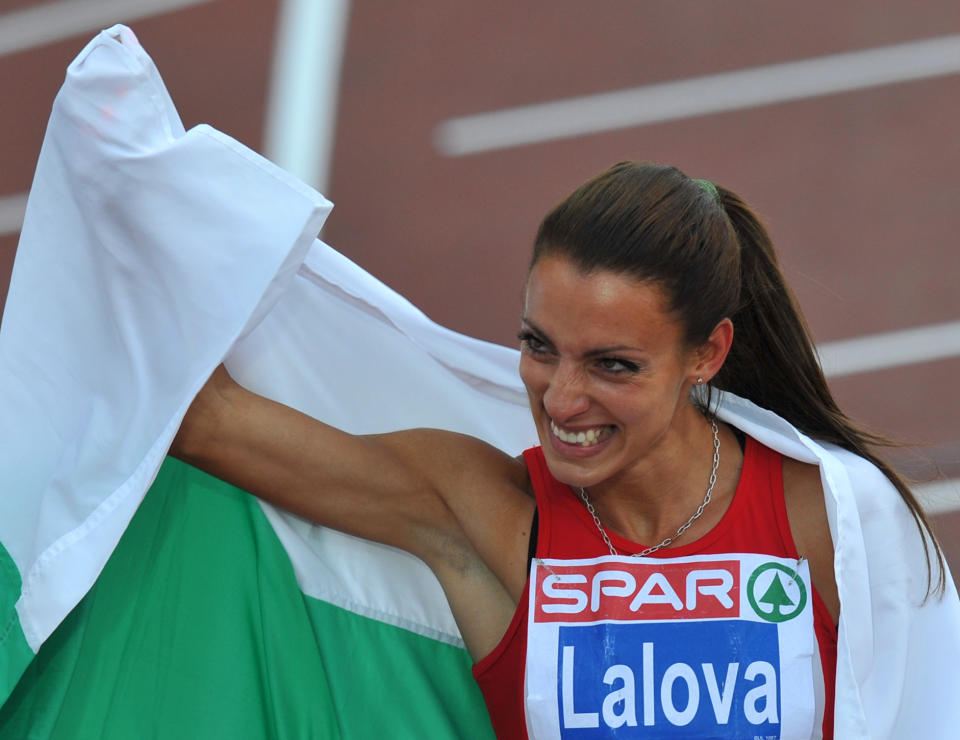 Bulgaria's Ivet Lalova celebrates after winning the women's 100m final at the 2012 European Athletics Championships at the Olympic Stadium in Helsinki on June 28, 2012. Bulgaria's Ivet Lalova won the race ahead of Ukraine's Olesya Povh and Lithuania's Lina Grincikaite. AFP PHOTO / YURI KADOBNOVYURI KADOBNOV/AFP/GettyImages