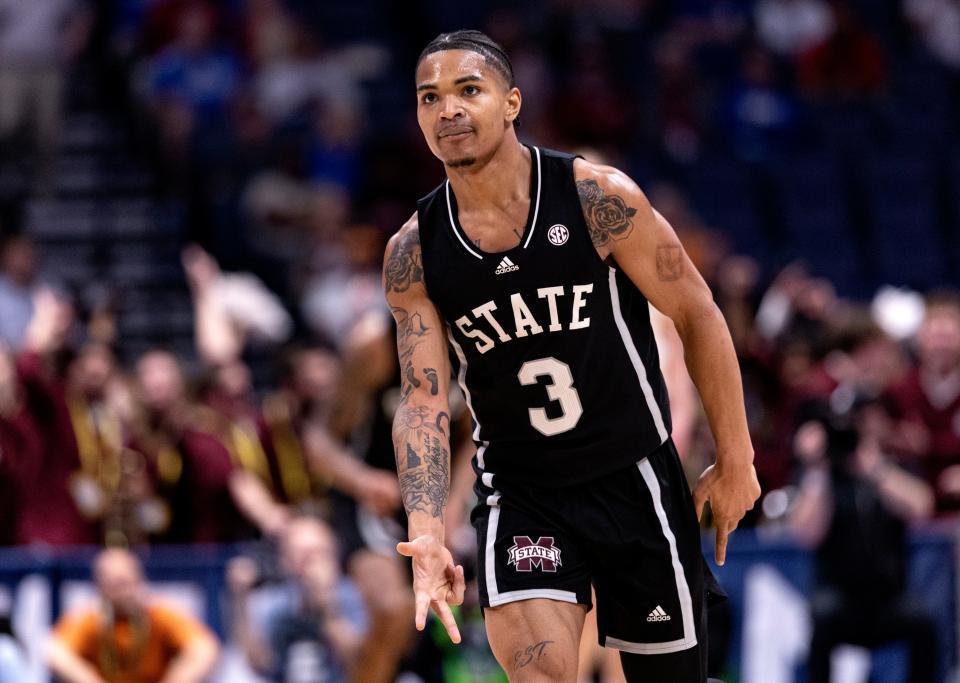 Then with Mississippi State, guard Shakeel Moore (3) signals after hitting a 3-pointer during a Southeastern Conference tournament game against LSU on March 14 at Bridgestone Arena in Nashville, Tennessee.