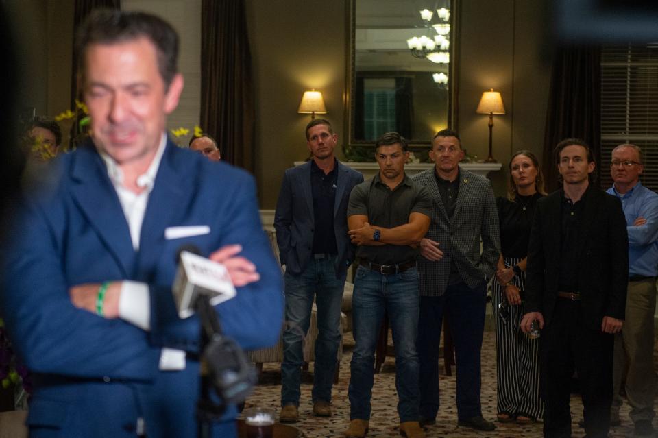 Chris McDaniel’s campaign staff looks on as McDaniel speaks to the media at Biloxi Visitors Center after polls closed in his race for Lieutenant Governor on Tuesday.