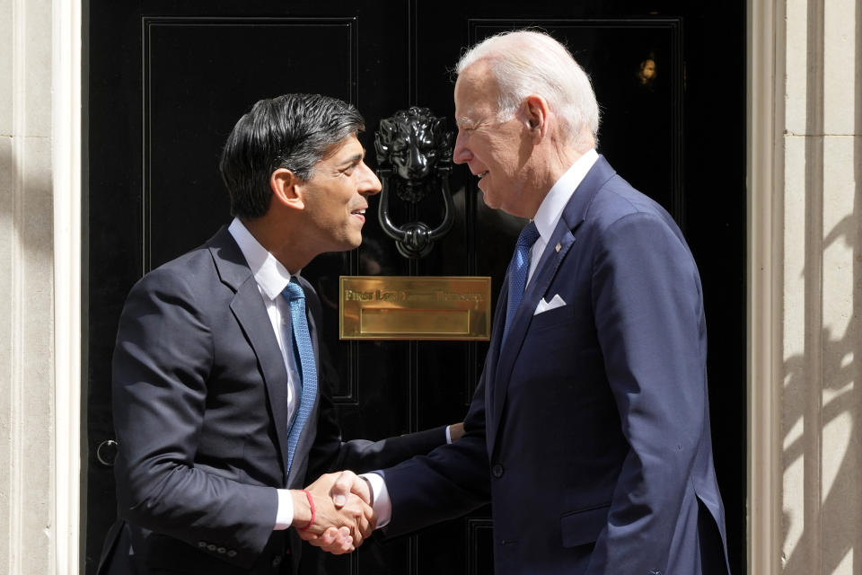 US President Joe Biden shakes hands with Britain's Prime Minister Rishi Sunak, left, outside 10 Downing Street in London, Monday, July 10, 2023. (AP Photo/Frank Augstein)