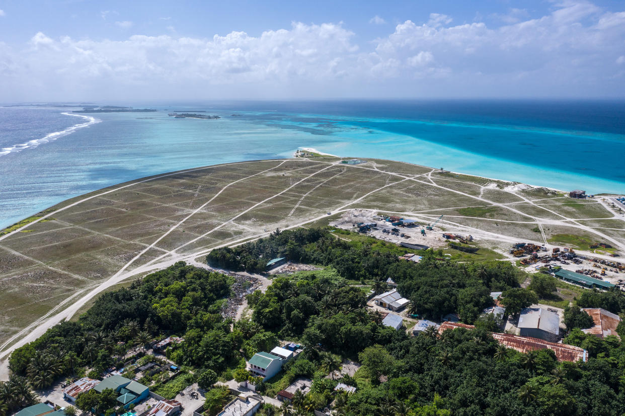 Image: An area of reclaimed land is pictured on the island of Thulusdhoo on Dec.10, 2019 near Male, Maldives. (Carl Court / Getty Images file)