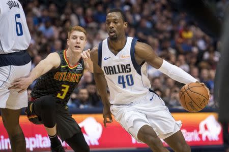 Dec 12, 2018; Dallas, TX, USA; Dallas Mavericks forward Harrison Barnes (40) dribbles the ball past Atlanta Hawks guard Kevin Huerter (3) during the second quarter at the American Airlines Center. Mandatory Credit: Jerome Miron-USA TODAY Sports